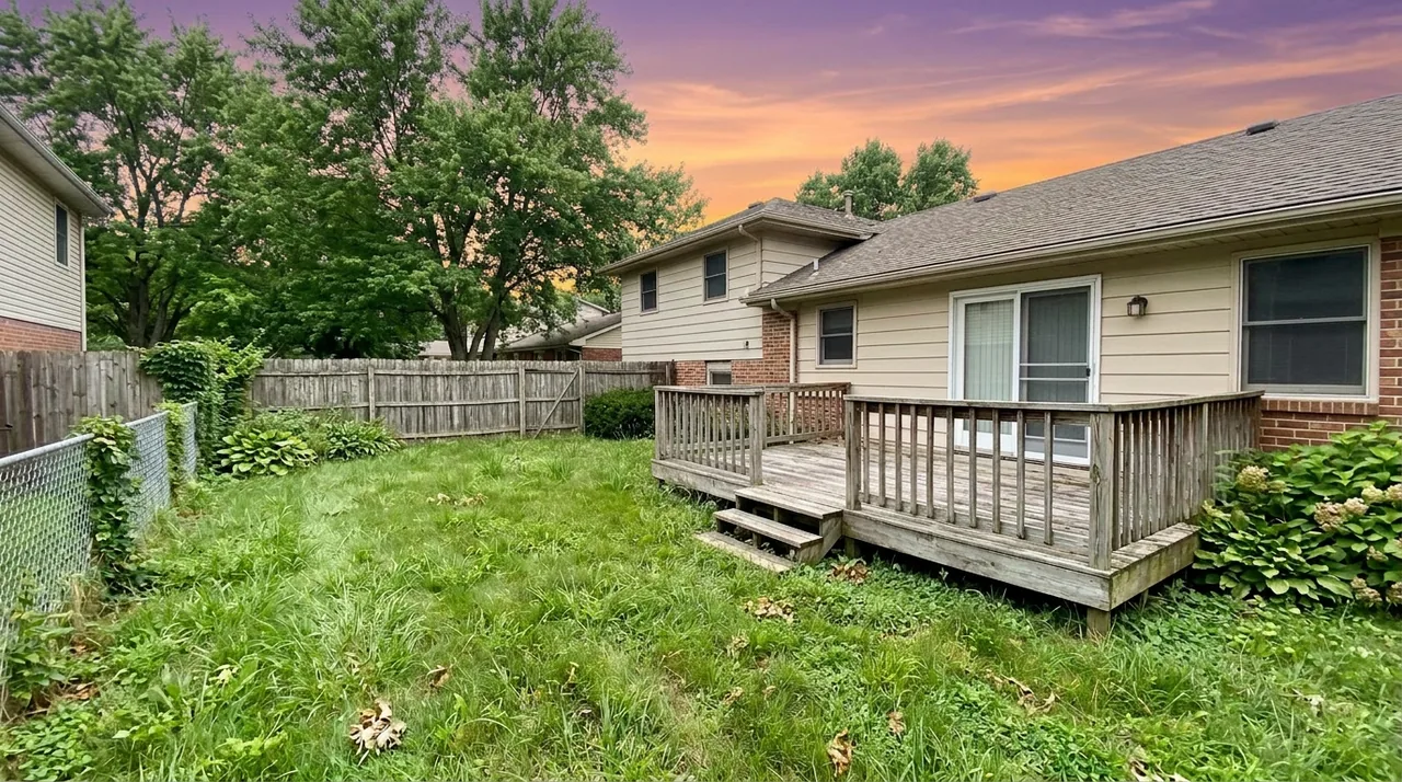 Same property with a dramatic twilight sky